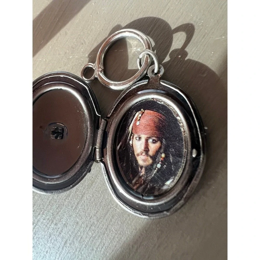 Disney Pirates of the Caribbean Locket Keychain Jack Sparrow Skull Silver Tone